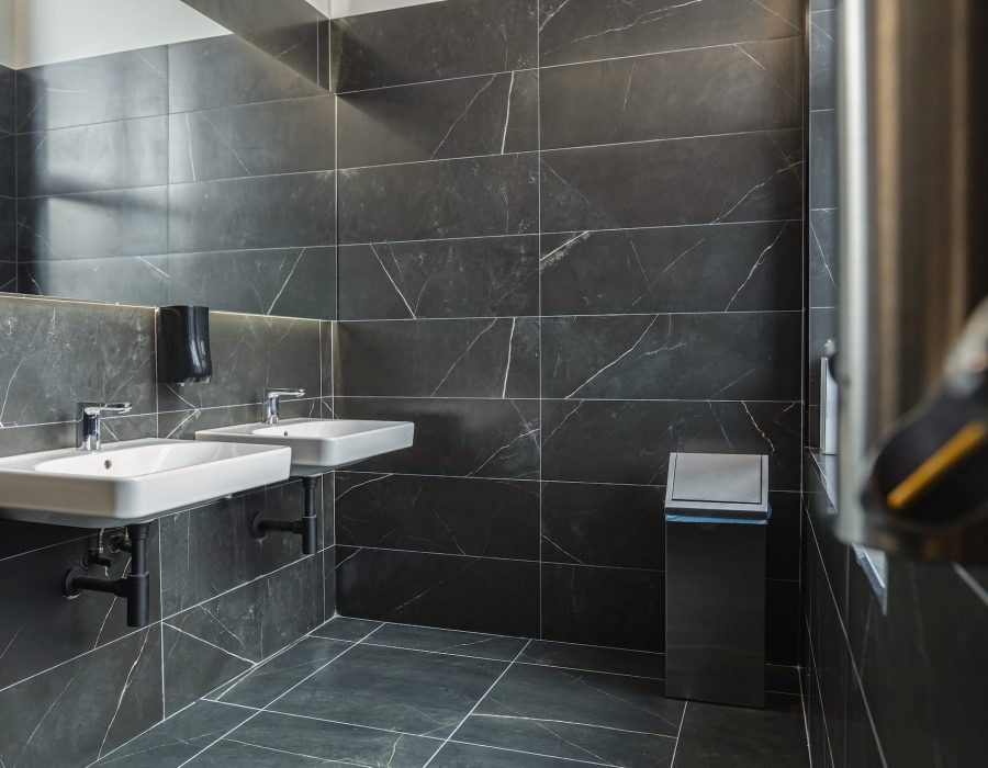 This is a modern toilet featuring a sleek sink and a large mirror mounted above it. The sink is made of white ceramic with chrome fixtures, and the mirror extends from wall to wall. The room is well-lit, creating a bright and functional space. SSUCv3H4sIAAAAAAAACpxUy46cMBC8R8o/jHwOkt82+ZUoh8Y2M9YCRmA2mqz232MYPGMmm0TKDVc13e3qLr99/nQ6oQZmb9DX09t6SmffdcscJ4g+DAnGX3Z8coN1U4m8TkziEgBfnpz1MUweuhJsIJrLAL1L4LB03Qq/bySaI8RldnPRSzs5N/qXhGiWM8yXJUY3zTGYI2EnB/0c/Za7gN0YZh/HS4hhPjCEsqk9INBBfz0iNjTu91pXuPbeTOEAjmGw4oC8OhOd+7mmZMVNDUR3TtIc7prn8O12PmViI9MfiUJoT3wTYmk2LEO35P/15+3j+/3SZzeYtem396LryXUObvPZe0TMMd1YoSpqma14g9sKBBFVoxrMpWwctGSrckuNXn6kyfXbrfeksFgfChVeg4FuftIL/AgTHP4bJ2/8cC6QEC/beuZMJixDnK7l5VEXwghNty5Im8q4jF9gnlO4zXg5q2SG0Bd1hhA3DfasyKZhrkfCmKaa1UooJhXVmKFyry8+5dnayQ0uYxfAurXofWDFxhNFsOZKYHEf3fPu5xBWhBxckAOULgKe/JBjdP2Iyc7YOSnUg8seIYoKIYgSsuBKt+wBurxA4ZtES02UwtkthYOIYppJUeOibuGlTBN9Y/Pmr4vd+6TQUdOn29Qc/12uWrB/SV7XhaJPMxOSlFp+rLfW5dA+0I3KWn4suhSYcflnTamilPxFN0nIZq7d9/fXN1X3tnyRsm6oh7M3nRtmyjHDmAhxd9RBP8QIEYnGD/5JPkQ5qzlXWOzuOMiHCMZSpQqsfhR4kg8pnOaefCbvIQf1UC0xTwJq/uB38RAF0FrJprLMtOm5Uuml4qypgBOjhcMM2kdbhaxIUkJqzfGdLERFDqzEzNlKGk0rrgytakx0ZYA2lurGGNJuj+CutF+3E7VYWlNrUjFGUy9Yt1XDUkMClNXctkkDSH+9/wIAAP//AwCjrvi0pQcAAA==