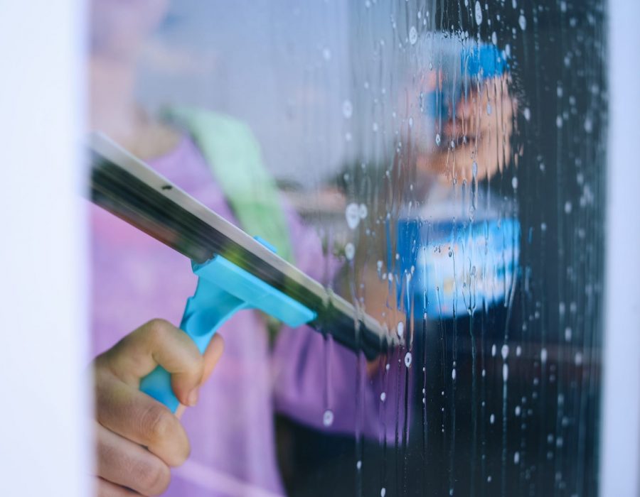 woman-cleaning-window